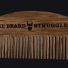 The beard struggle KYLVER COMB, De fijne houten tanden glijden door je haar alsof je baard een feestmaal is dat door de oude goden wordt geschonken